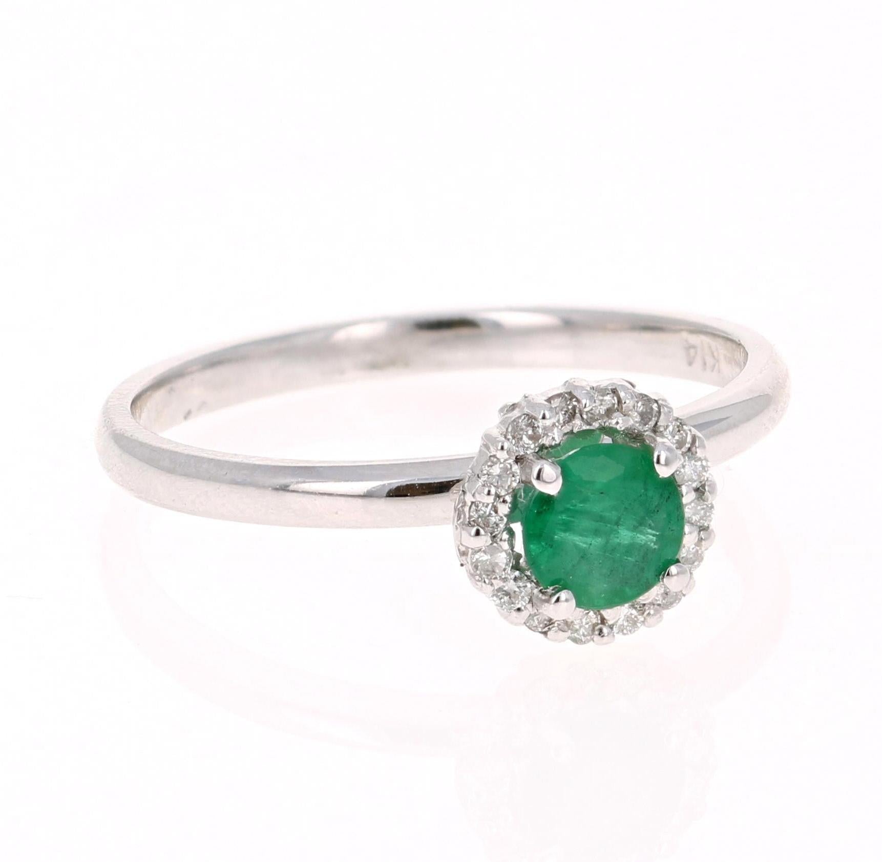 0.64 Carat Emerald Diamond White Gold Cluster Ring