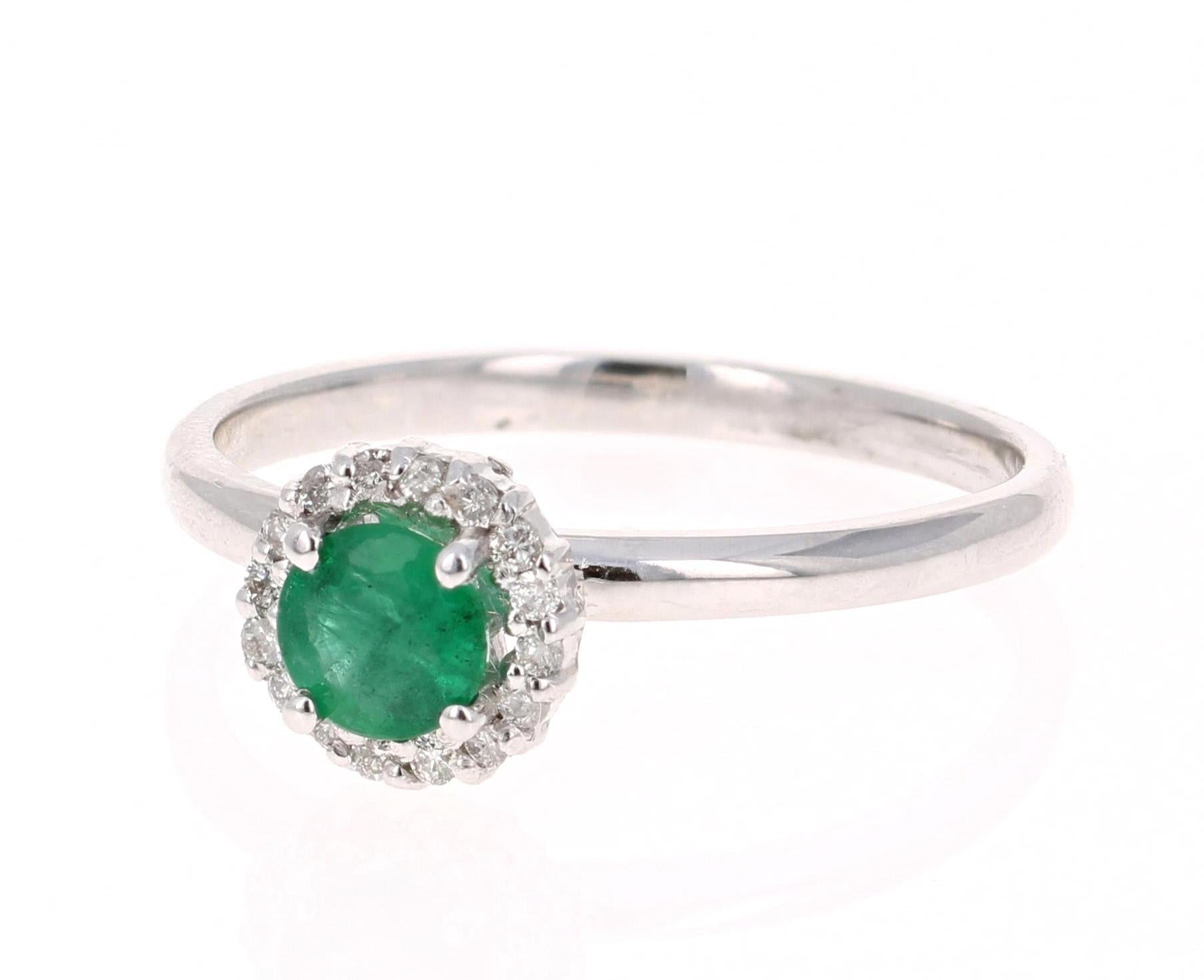 0.64 Carat Emerald Diamond White Gold Cluster Ring