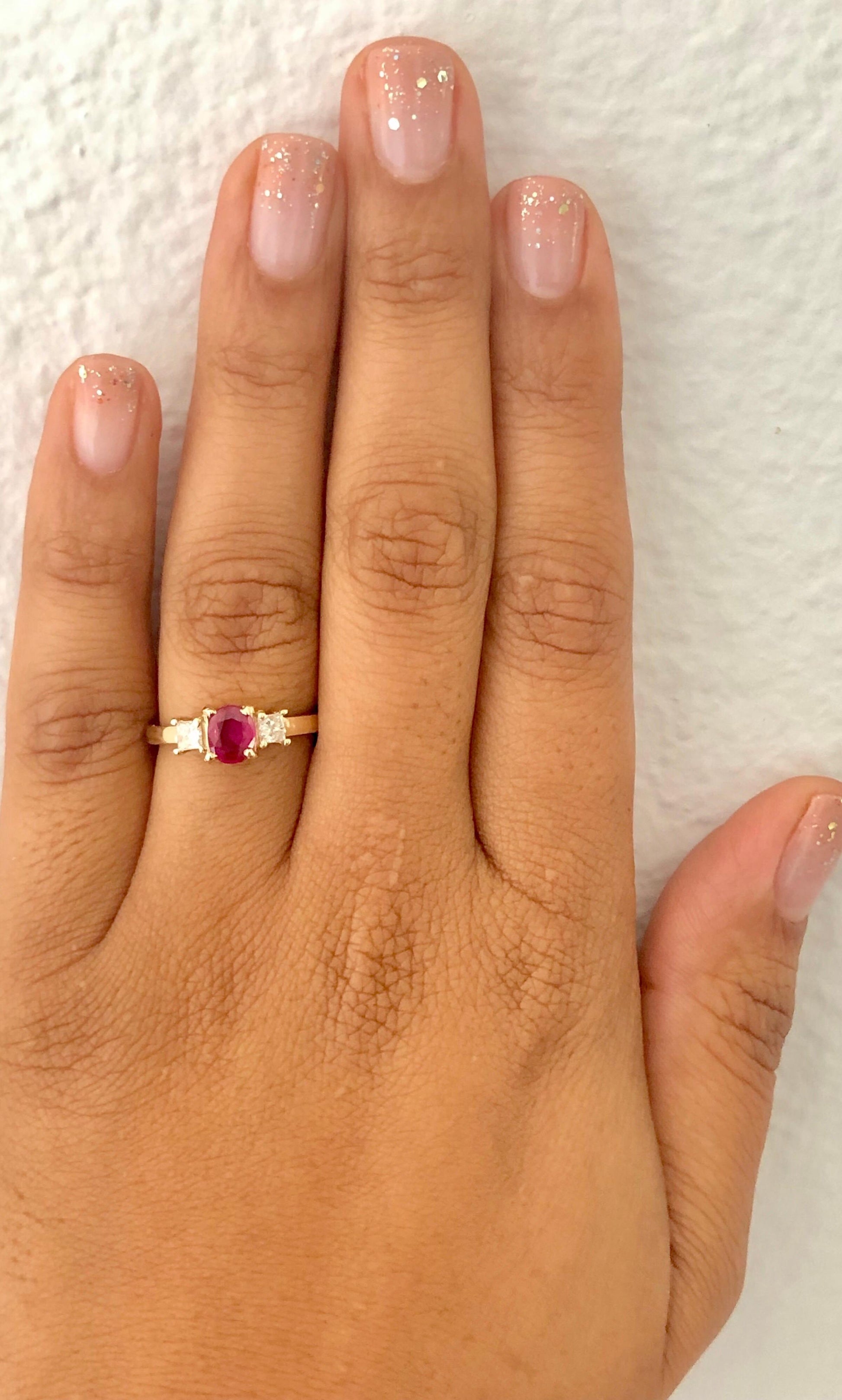 0.94 Carat Ruby Diamond Three-Stone 14 Karat Yellow Gold Ring