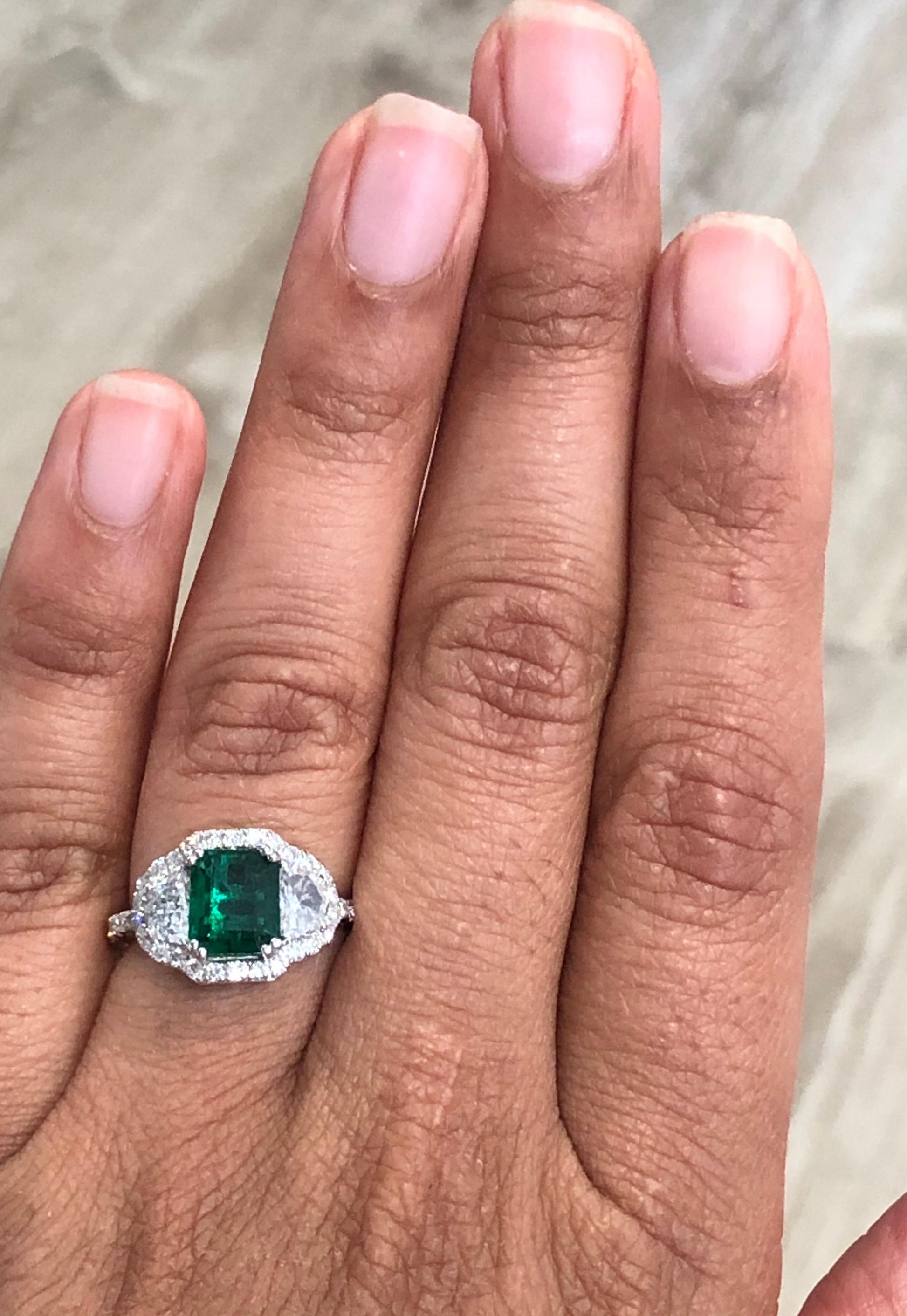 GIA Certified 2.42 Carat Emerald Diamond 18 Karat White Gold Three-Stone Ring
